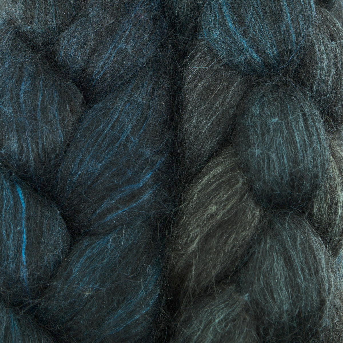 Hand painted alpaca mulberry silk combed top, deep spruce, slate grey and peacock teal, braid closeup