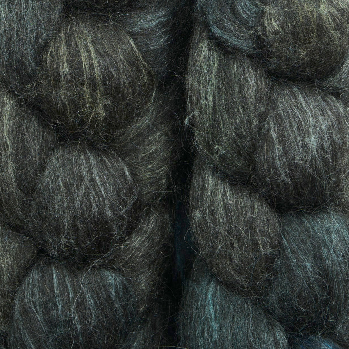 Hand painted alpaca mulberry silk combed top, charcoal, stone grey and deep teal, braid closeup