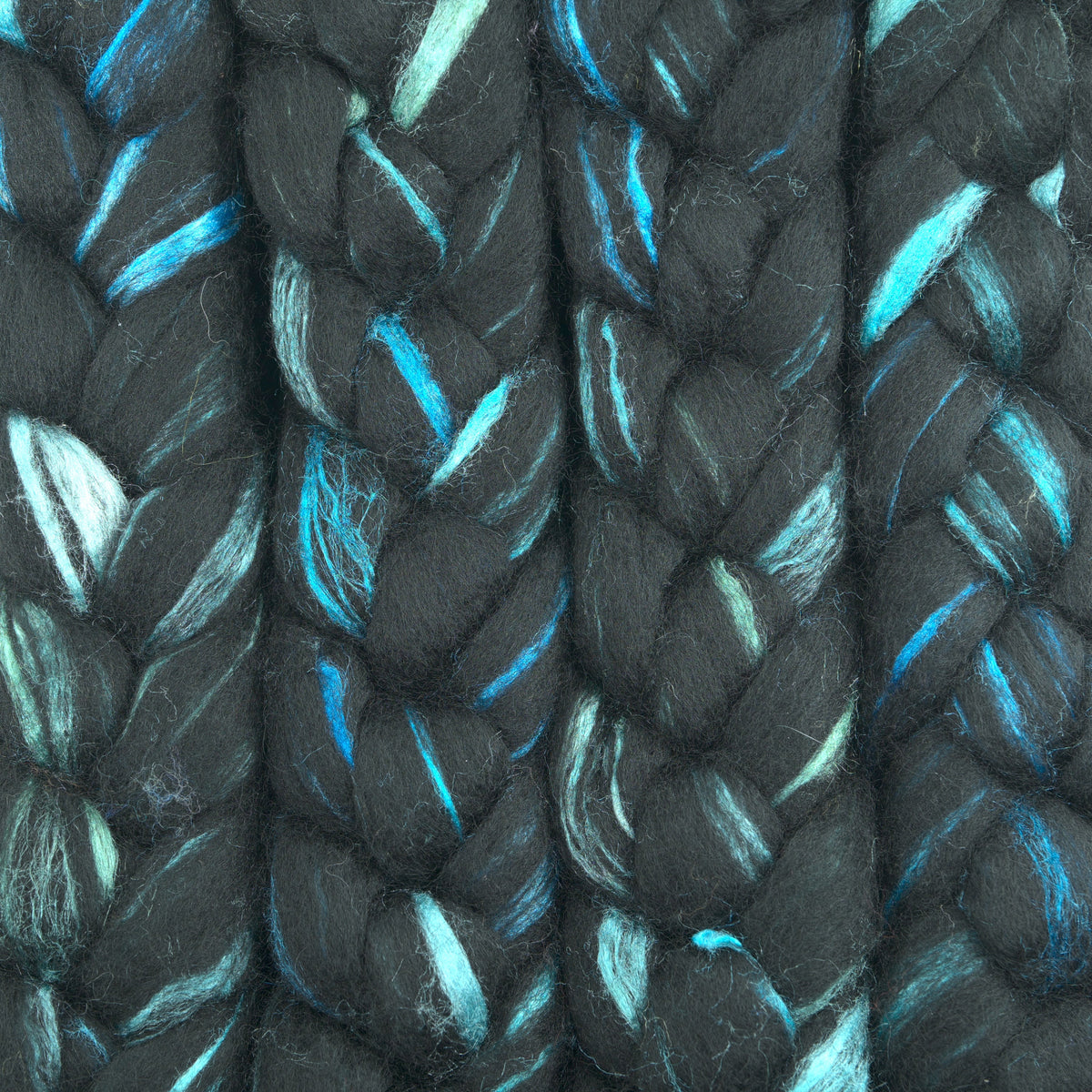 Hand painted black BFL tussah silk combed top, charcoal, slate grey and turquoise, braid closeup