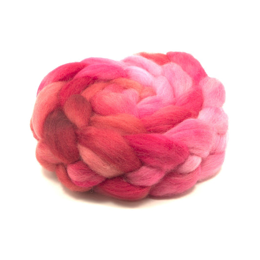 Hand painted Corriedale combed top in crimson, hot pink and raspberry