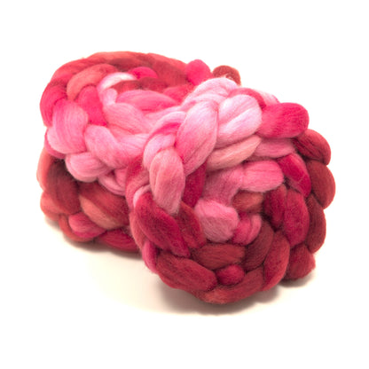 Hand painted Corriedale combed top in crimson, hot pink and raspberry
