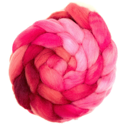 Hand painted Corriedale combed top in crimson, hot pink and raspberry