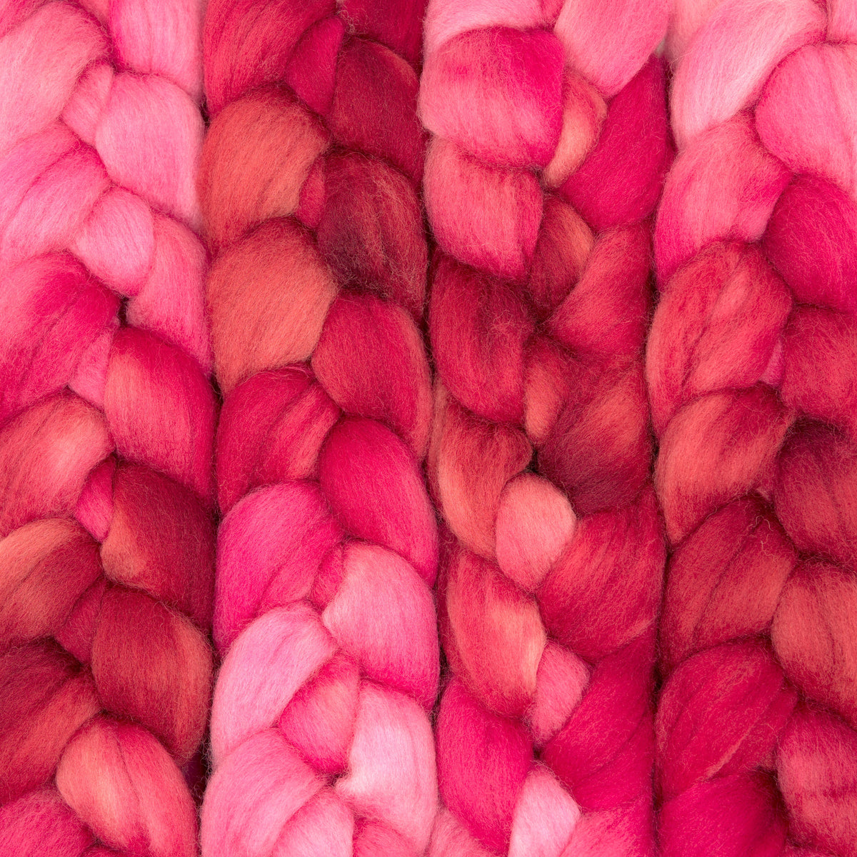 Hand painted Corriedale combed top in crimson, hot pink and raspberry